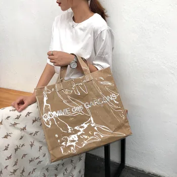Håndtaske kvindelige stor kapacitet elevens personlighed kvindelige taske ins simple koreanske version af jelly gennemsigtig kraftpapir shopping